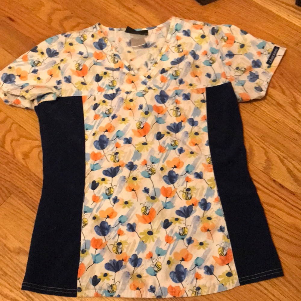 Cherokee scrub set. Top xs bottom xxs. But bottoms fit more like a medium.